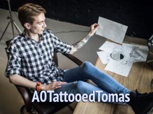 A0TattooedTomas